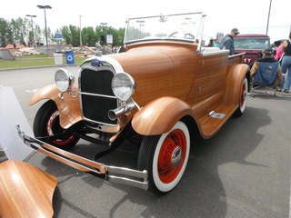 Completed 1928 Ford Model A truck with body made of cherry wood! note the extra front fender for the public to examine to see how it was formed.