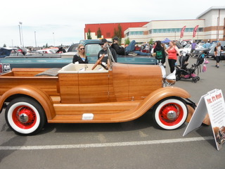 Side view with specially formed steering wheel and upholstery work that was done by Musgrave.